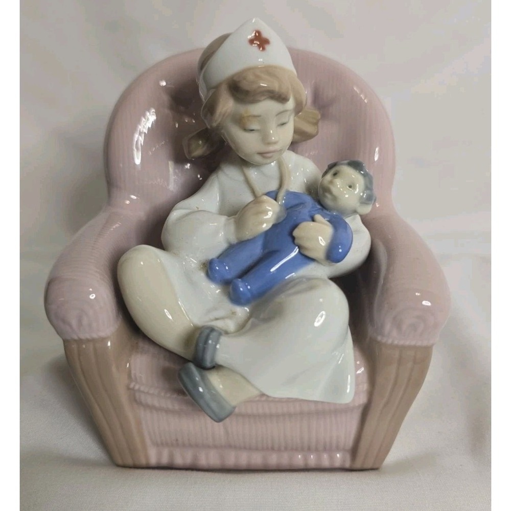 Retired Nao by Lladró "Playing Nurse" Figurine (Model #1055), Hand Made In Spain